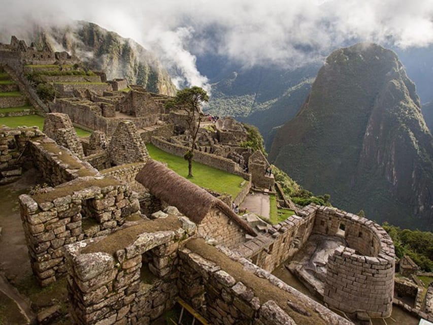 TOUR TO MACHU PICCHU FULL DAY BY TRAIN – The Best Adventure - The 30-Minute Bus Climb: Getting to the Main Entrance on Time